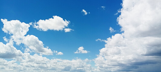 Summer blue sky cloud gradient clear white background. Calm bright winter weather background with beauty clear clouds in sunlight. Surrounding gloomy vibrant cyan landscape day horizon silhouette view