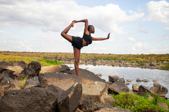 Yoga stretch and meditation outdoors in the countryside