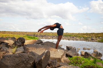 Yoga stretch and meditation outdoors in the countryside