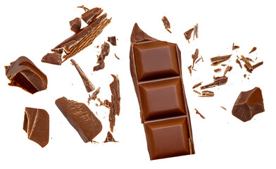 Chocolate explosion isolated on white. Flying milk Chocolate pieces. Chocolate flakes and  chips Top view. Flat lay.
