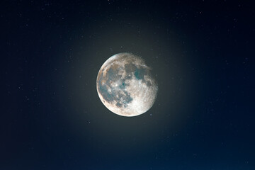 Full moon in the blue sky