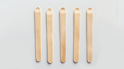 Wooden ice cream sticks on a white background, isolated