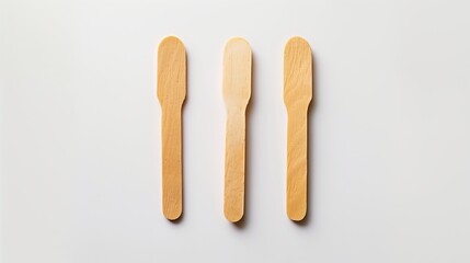 Wooden ice cream sticks on a white background, isolated