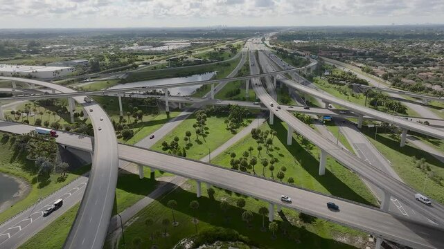 Aerial view of sawgrass interchange with modern infrastructure and traffic, Davie, United States.