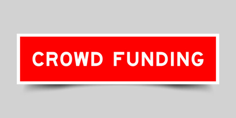 Red color square shape sticker label with word crowd funding on gray background