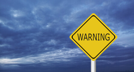  danger,Hurricane Idalia warning sign against a powerful stormy background with copy space. Dirty and angled sign with cyclonic winds add to the drama.hurricane season sign on cloudy background