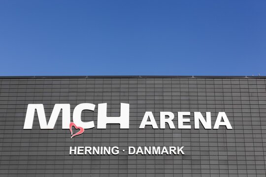 Herning, Denmark - May 13, 2018: MCH arena sign on a wall. MCH Arena is a football stadium in Herning, Denmark. It is the home stadium of Danish football club FC Midtjylland