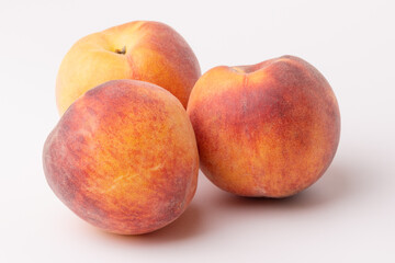 Peaches close-up on a white background.