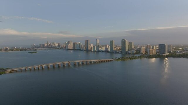 Aerial view of biscayne bay with julia tuttle causeway and miami skyline at sunset, miami, united states.