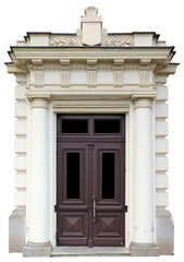 Obraz premium The entrance to the old building is decorated with columns and stucco isolated