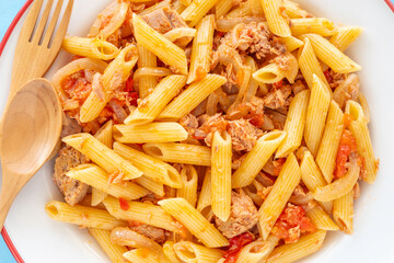 Tuna Pasta on ceramic plate. Top view.
