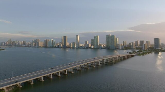 Aerial view of biscayne bay with julia tuttle causeway and miami skyline at sunset, miami, united states.