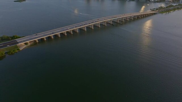 Aerial view of biscayne bay with julia tuttle causeway and miami skyline at sunset, miami, united states.