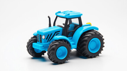 Children's toy blue tractor on a white isolated background.