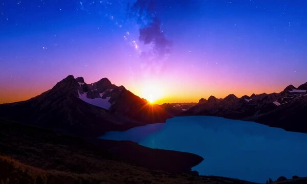 Timelapse of Par&oacute;n Lagoon in the Andean Cordillera Blanca, Huascar&aacute;n, Peru - Day to Night with Starry Sky and Milky Way