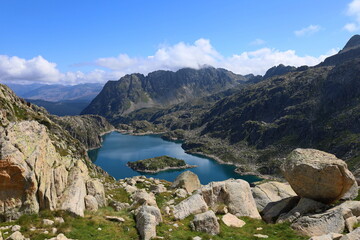 Mountain lake Lac de Mar in Aiguestortes and Sant Maurici National Park, GR11 long-distance hiking...