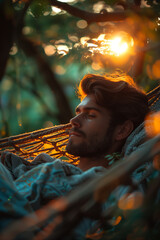 Relaxed man resting in hammock at sunset, peaceful nature retreat with golden light