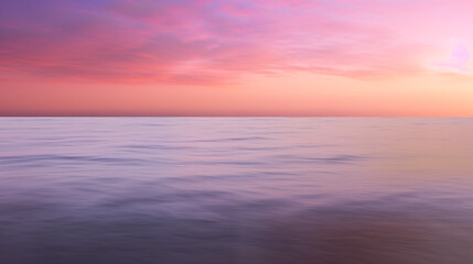 Dramatic Sunset Over Ocean With Colorful Sky and Smooth Waters