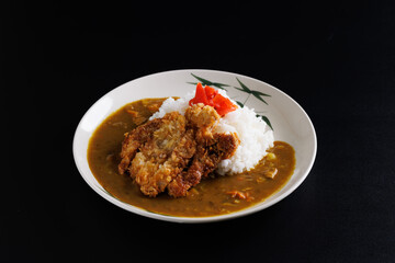 Tonkatsu curry japanese food isolate in black background