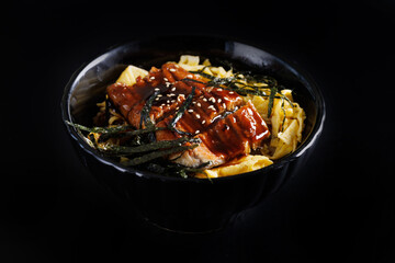 Teriyaki Pork with rice japanese food isolate in black background
