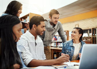 Learning, friends and discussion in college library for research project, education and assignment teamwork. Diversity students, study group and people with talking at university for exam preparation