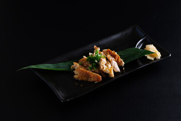 Chicken Teriyaki grill chicken Japanese Food isolate in black background