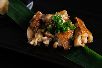 Chicken Teriyaki grill chicken Japanese Food isolate in black background