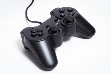 Black controller on white background, Video game device, Joystick on a white background.