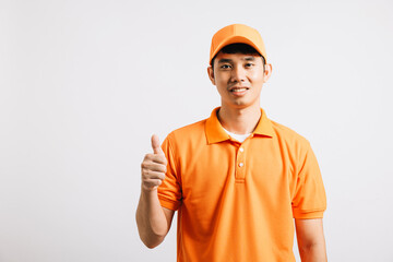 Portrait professional attractive delivery happy man standing he smile wearing orange t-shirt and cap uniform showing thumb up gesture looking to camera, studio shot isolated on white background
