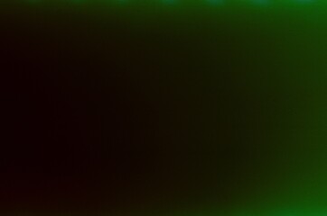 Film texture, noise and light leak. It gives an abstract, moody feel, with a hint of vintage film texture due to the graininess and subtle imperfections like spots and scratches.