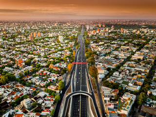 Expansive Highway Stretching Through Urban and Rural Landscapes, Featuring Smooth Asphalt Roads,...