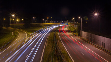 Long Exposure of a Highway Off-Ramp at Night in Brzesko with Car Lights Trail | Długi czar naświetlania - zjazd z autostrady nocą w Brzesku ze smugami światła samochodów