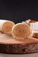 Typical dessert from northeastern Brazil called Bolo de Rolo. Stuffed with dulce de leche or guava paste. Selective focus