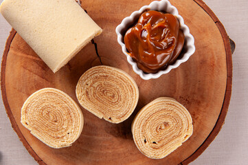 Typical dessert from northeastern Brazil called Bolo de Rolo. Stuffed with dulce de leche or guava paste. Top view
