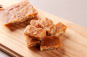 Typical sweet from northeastern Brazil made from sugar cane called Rapadura. Copy space. Selective focus