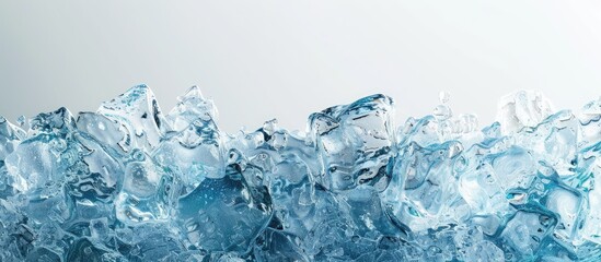 Segment of ice Textured blue hued cold ice block with a frosty surface set against a light gray background. Copy space image. Place for adding text and design