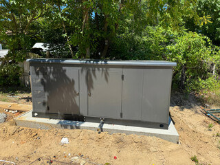 Installation natural gas propane standby generator for residential use was completed in backyard