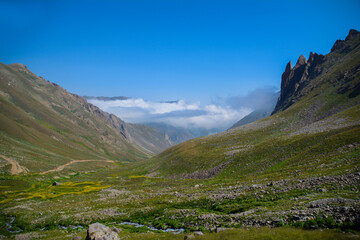 Fototapeta premium Mystical mountain. Beautiful rocky mountain in fog. Beautiful nature.. Mount wall art. Mountain print set