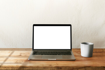 Fototapeta premium Laptop png mockup with coffee mug on wooden table