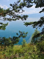 Summer landscape with mountains and boat on Circum-Baikal Railway