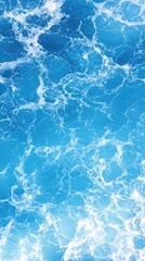 Fototapeta premium The composition features a dynamic swirl of blue water at the center, showcasing the beauty of ocean waves in high resolution, evoking a sense of calmness and energy