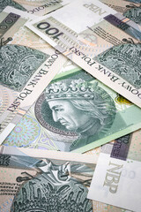 Polskie banknoty stuzłotowe, biznes i ekonomia.