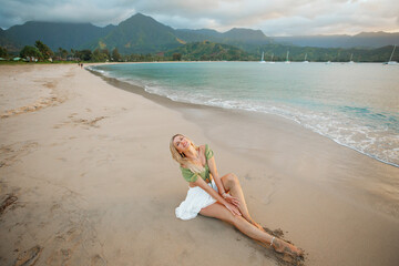 Cute blonde posing on the beach, Hawaii