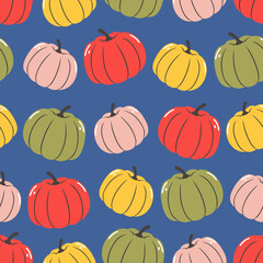 Seamless pattern with pumpkins. Red, green, yellow and pink pumpkins on blue background.