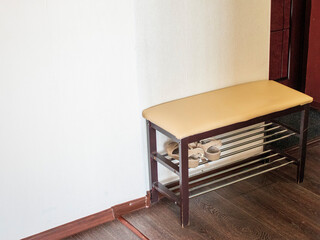 Shot of the shoe rack in the modern apartment. Interior design