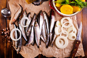 Salted Baltic fish with potato and onion