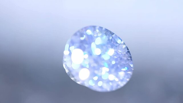 Sparkling moonstone with subtle glow and soft bokeh effect