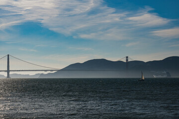 Luxury cruiseship cruise ship liner Serenity sail away departure from San Francisco port through...