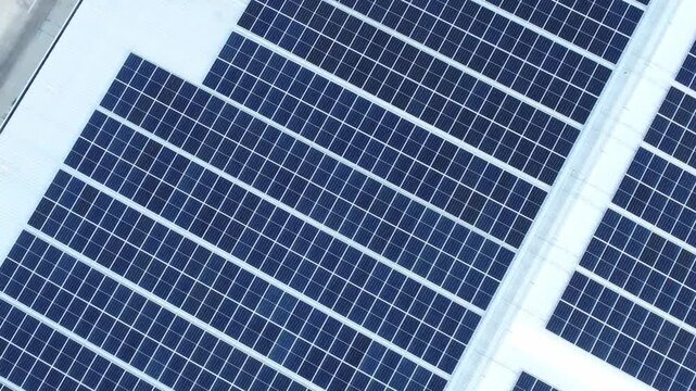Solar Panels Installed on Building Roofs to Generate Electricity and Reduce Costs, Sustainable Energy Solution, Sunlight-Powered Electricity, Renewable Energy Technology, Eco-Friendly Power, Green Bui