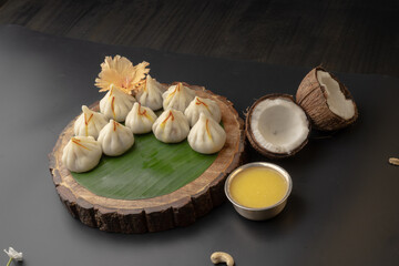 Steamed Modak, white modak, ukdiche modak made from rice flour and coconut jaggery filling. Modak is a traditional Indian sweet made during Ganesh Utsav
